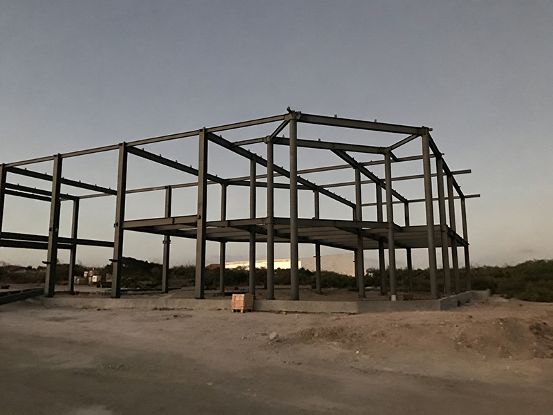 โซลูชันโครงสร้างเหล็กสำหรับอาคารแสดงสินค้า พร้อมโครงเหล็กเสริมแรง